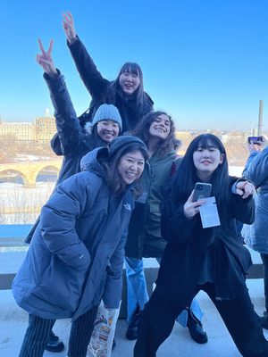 MELP students play for the camera on a winter day on the Guthrie Theater's endless bridge