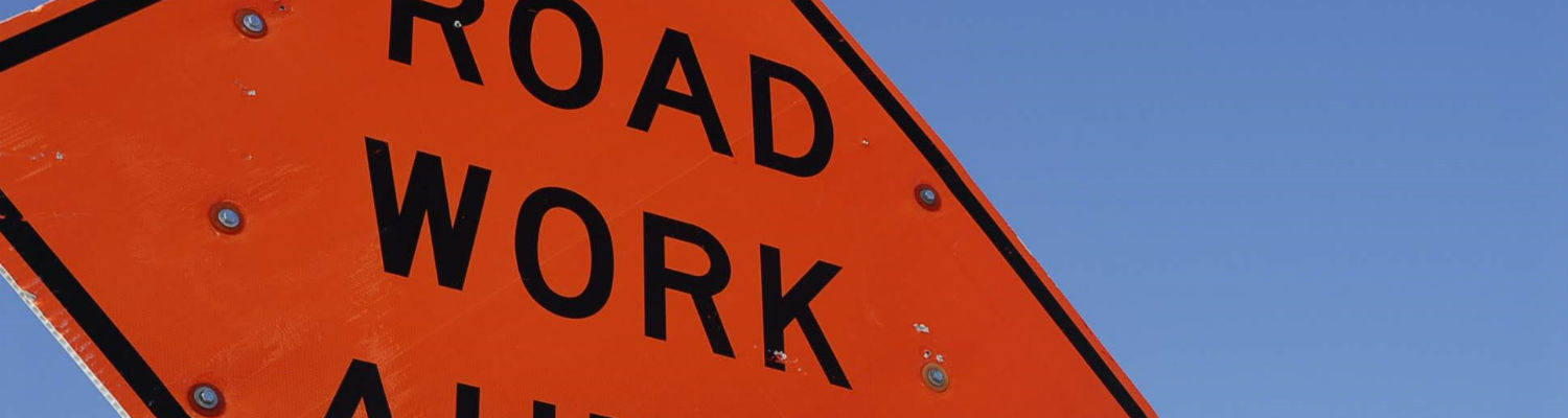 orange "Road Work Ahead"sign