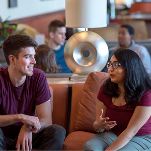 two U of M students enjoy conversation at the Union