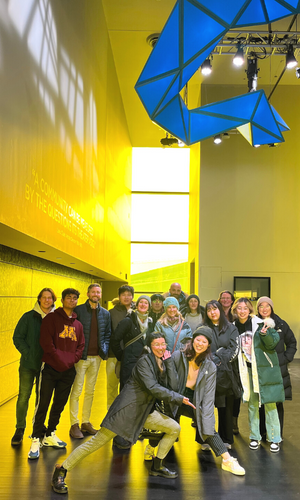 Exuberant MELP students play to the camera in the Guthrie Theater's Amber room