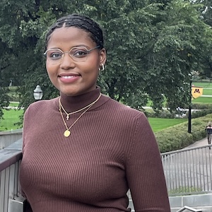 Valencia Williams on the pedestrian bridge over Washington Avenue