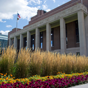 color image of front facade of Coffman Union on a blue sky autumn day