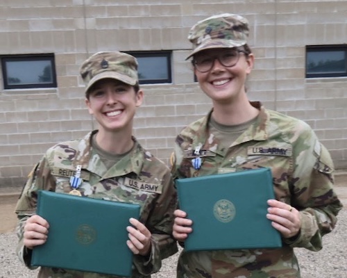 National Guard members Stephanie Reuter and Lauren Kitner