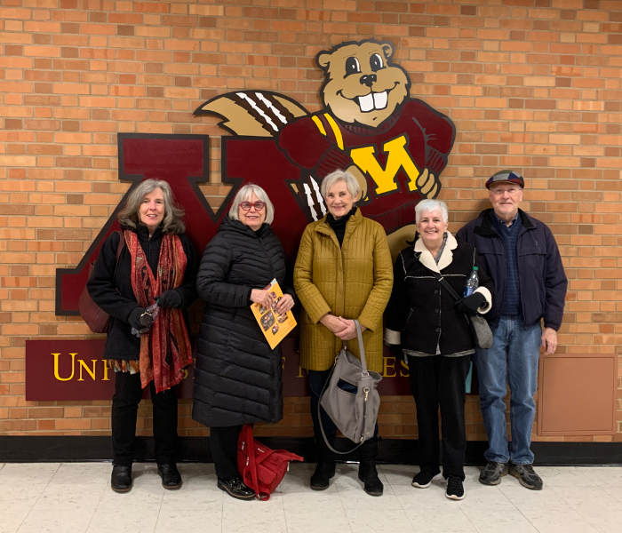 A small group of OLLI members gather before class on the U of M Twin Cities campus