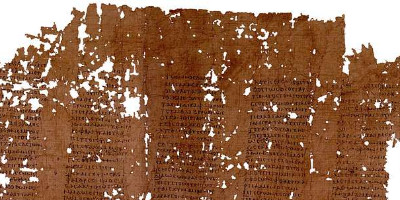 Photo of ancient and deteriorated papyrus with Greek writing
