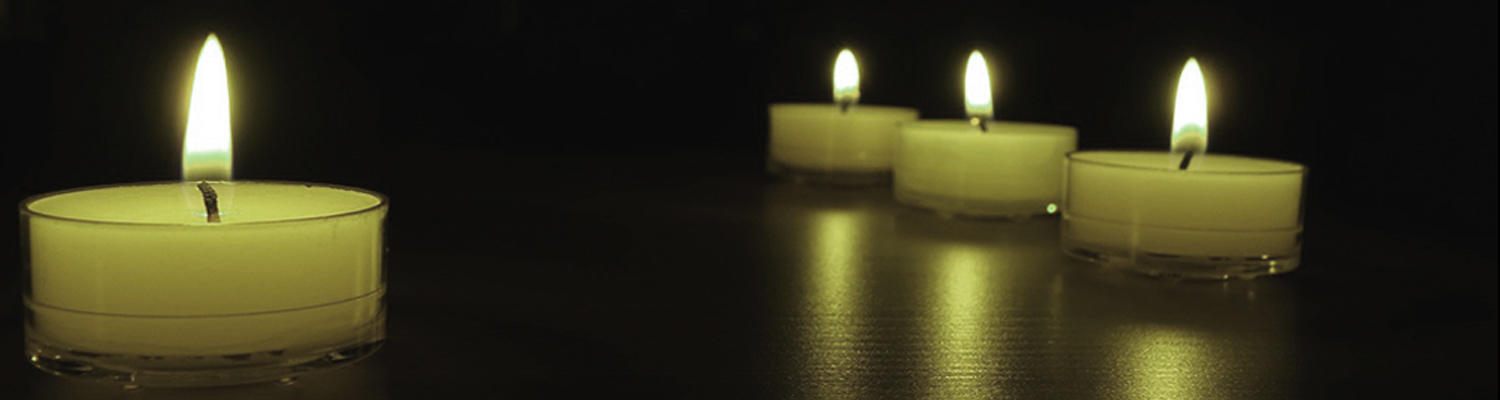 lighted tea light candle